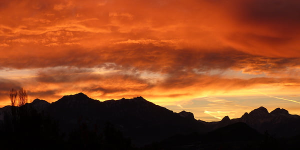 sunset over mountain range thumbnail