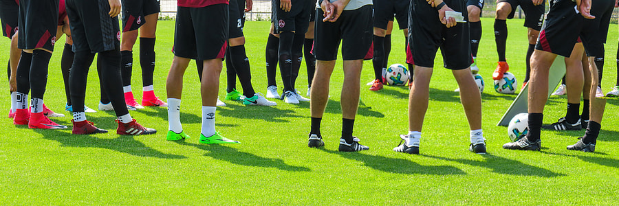photo of a soccer team's lower bodies thumbnail