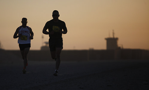 two person jogging photography during sunset thumbnail
