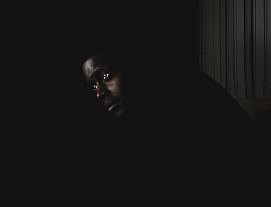 photo of man wearing black top thumbnail