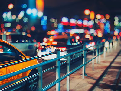 selective focus photo of blue metal rail near vehicle thumbnail