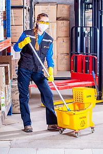 woman holding mop thumbnail