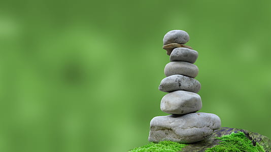 focal focus photography of stack of gray stones thumbnail