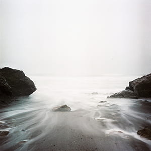 photo of boulder covered with fog thumbnail