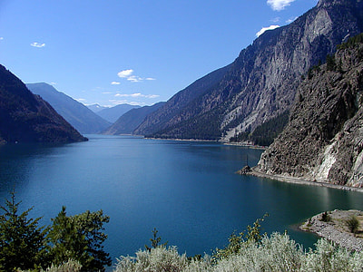 body of water between mountains thumbnail