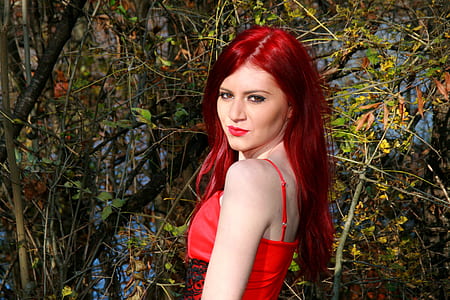 woman wearing red spaghetti strap top thumbnail