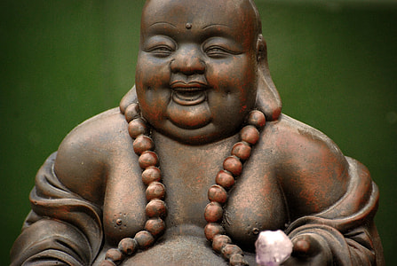 brown Budai figurine with green background thumbnail