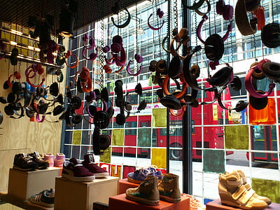 assorted headphones lot hanging on wall thumbnail