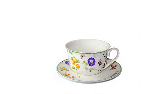 white and blue floral ceramic cup and saucer thumbnail
