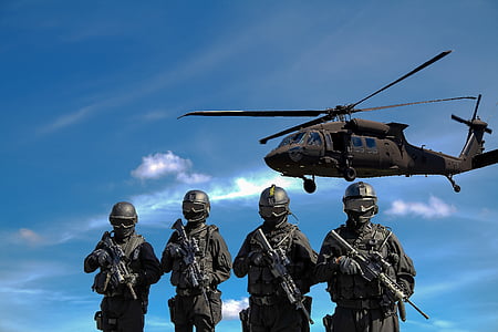 gray helicopter over four soldier thumbnail