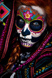 brown haired woman with face paint thumbnail