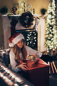 woman sitting holding art thumbnail