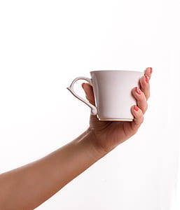 person holding teacup thumbnail
