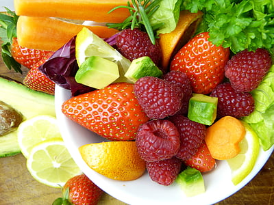 assorted berries in white ceramic bowl thumbnail