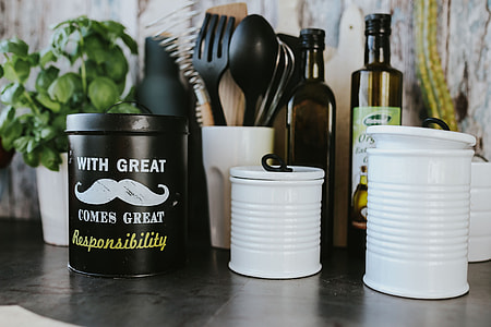 Kitchen utensils and cans by the wall thumbnail