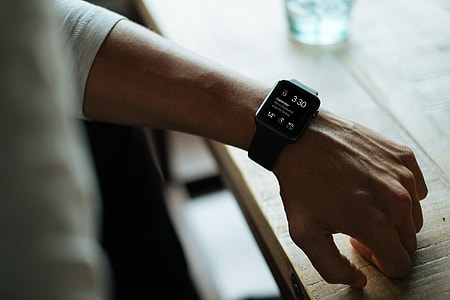 black smartwatch displaying 3:30 thumbnail