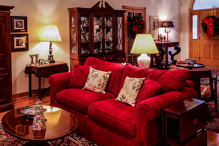 sofa chair near table lamp inside white painted room thumbnail
