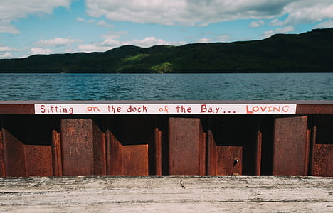 sitting on the dock of the bay loving wall decor thumbnail