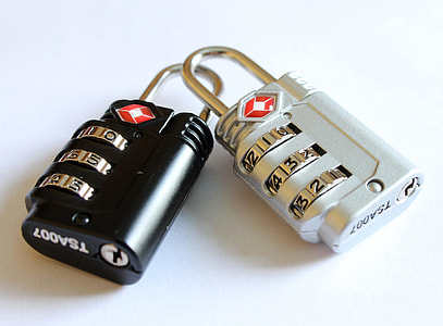 photography of black and gray combination padlocks thumbnail