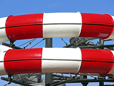 red and white flume pool under blue sky thumbnail