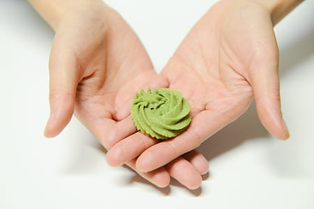 Close-Up Photography of a Person Holding Icing thumbnail