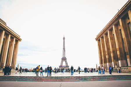 people standing beside Eiffel Tower, Paris thumbnail