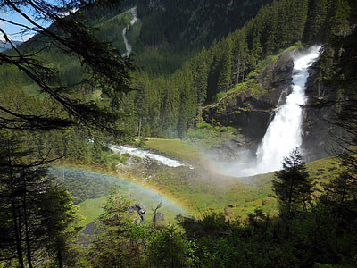 high angle view of waterfalls near woods thumbnail