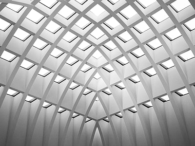 photo of white concrete building at daytime thumbnail