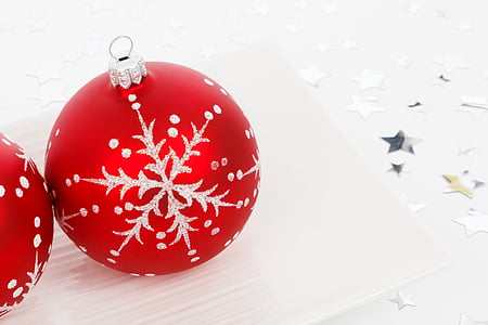 two red-and-gray baubles on white board thumbnail