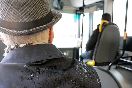 Man Wearing Black Coat While Wet thumbnail