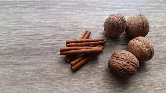 four brown walnuts thumbnail