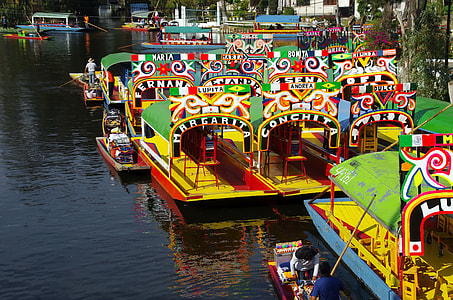 boats on body of water during day thumbnail