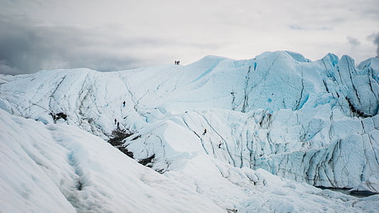 snow capped mountains at daytime thumbnail