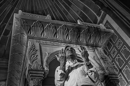 grayscale photo of man inside room thumbnail