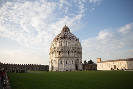 Dome building at Baptistry of St John, Pisa, Italy at sunset. rnPiazza dei Miracoli. thumbnail