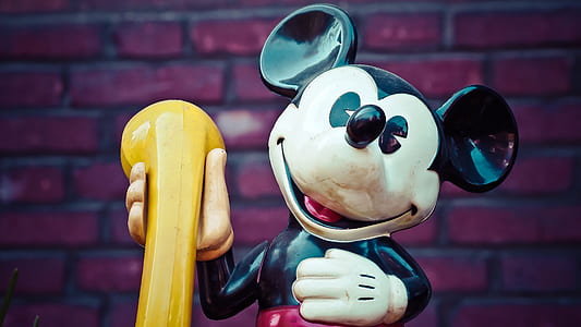 Mickey Mouse holding yellow telephone thumbnail
