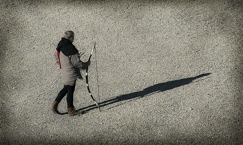person holding composite bow thumbnail