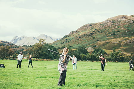group of people playing baseball thumbnail