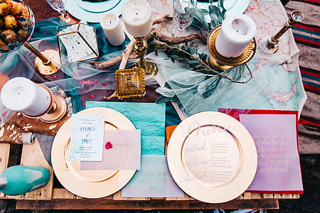 two white ceramic plates on brown wooden table thumbnail