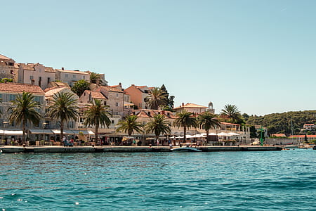 village beside body of water thumbnail