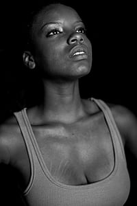 gray scale photo woman wearing tank top thumbnail