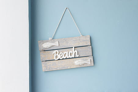 white wooden Beach pallet signage hanged on wall thumbnail