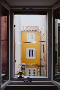 Drink coffee in a golden cup at the window thumbnail