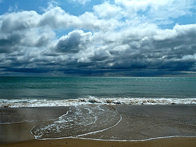 seashore under columbus clouds thumbnail