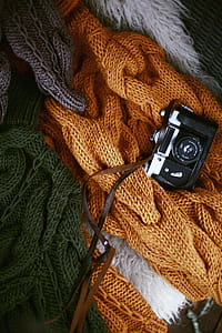 Black and White Camera on Knit Textile thumbnail