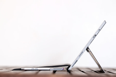 grayw click pen near tablet with stand thumbnail