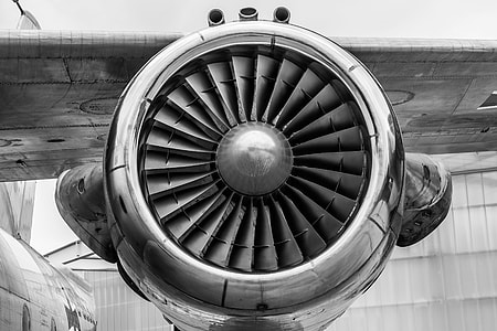 grayscale photo of single-propeller plane thumbnail