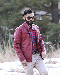 man in red leather zip-up jacket wearing sunglasses thumbnail