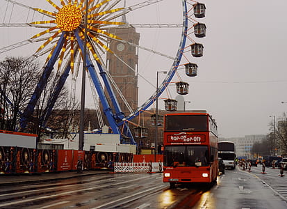 double decker bus near ferris wheel thumbnail