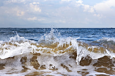 sea waves during daytime thumbnail